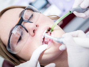 A Woman Undergoing a Root Canal Treatment.
