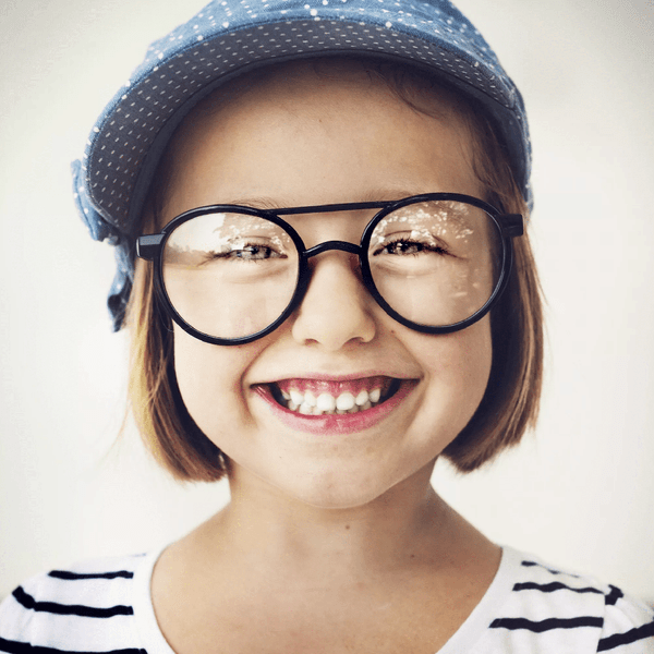 Happy Little Girl With Black Eyeglasses