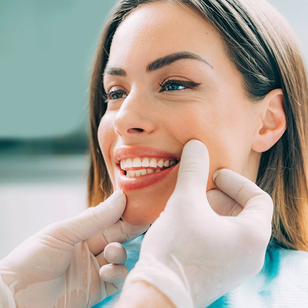 A Pretty Woman Having Her Teeth Checked